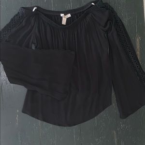 Off the shoulder black bell-bottom top